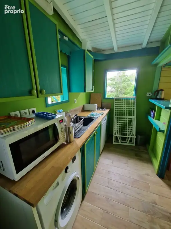 DESHAIES, Villa plage à pied, 2 bungalow, garage et piscine, sur 1 965 m² de terrain arboré - photo 18
