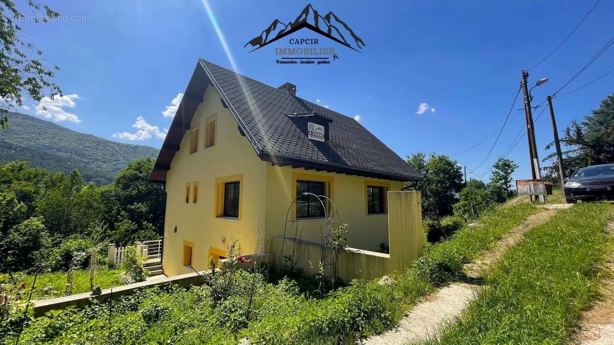 Maison 4 faces avec jardin - QUERIGUT - photo 4