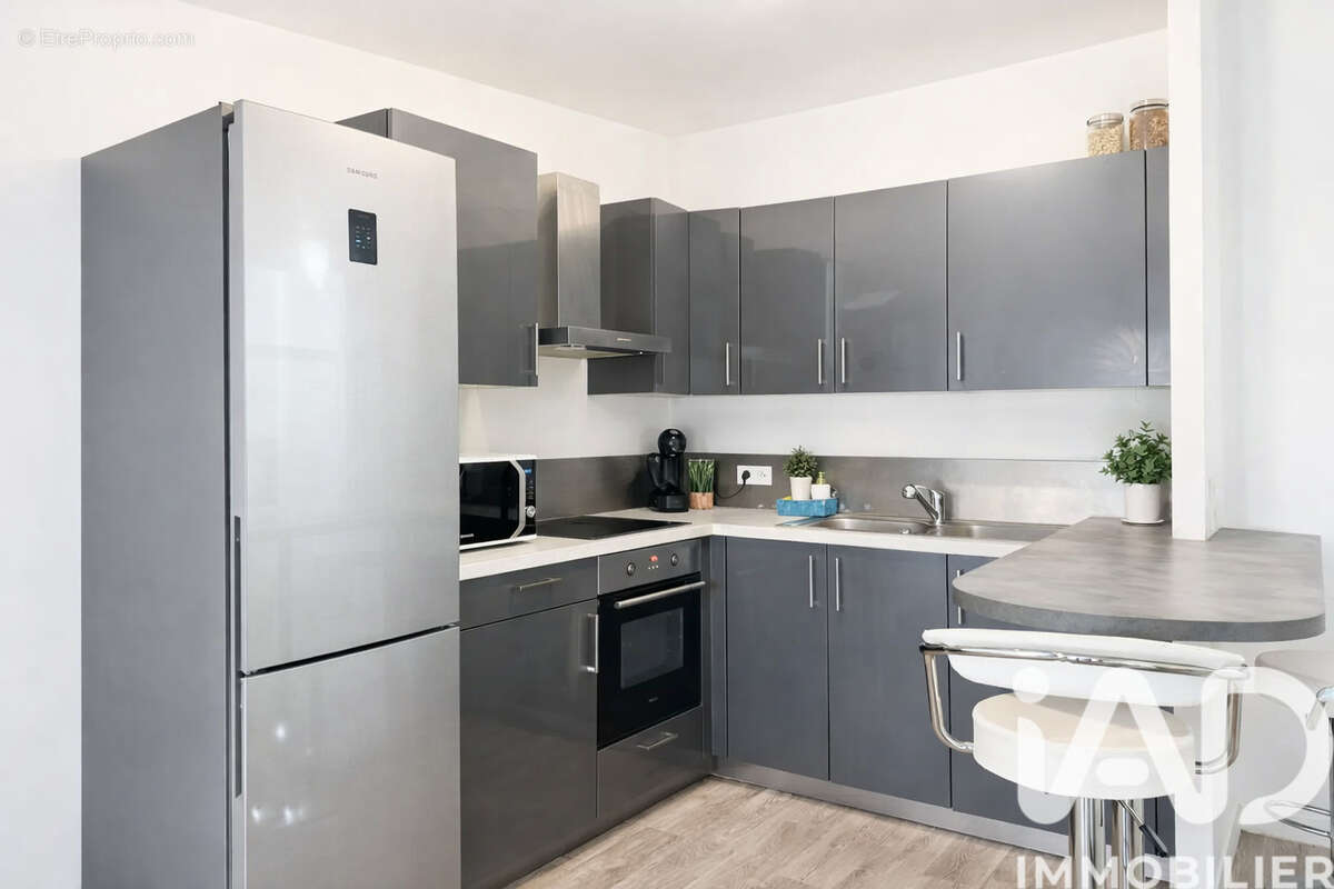 Photo 2 - Appartement à SAINT-DENIS