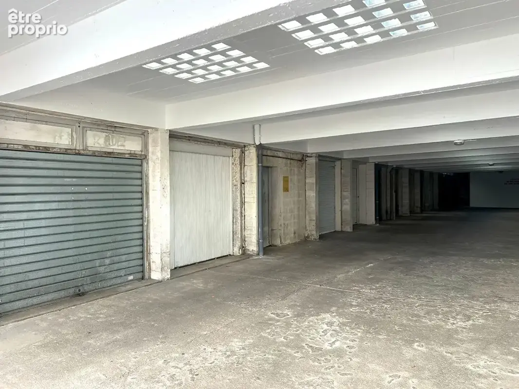 Garage fermé avec cave - photo 2