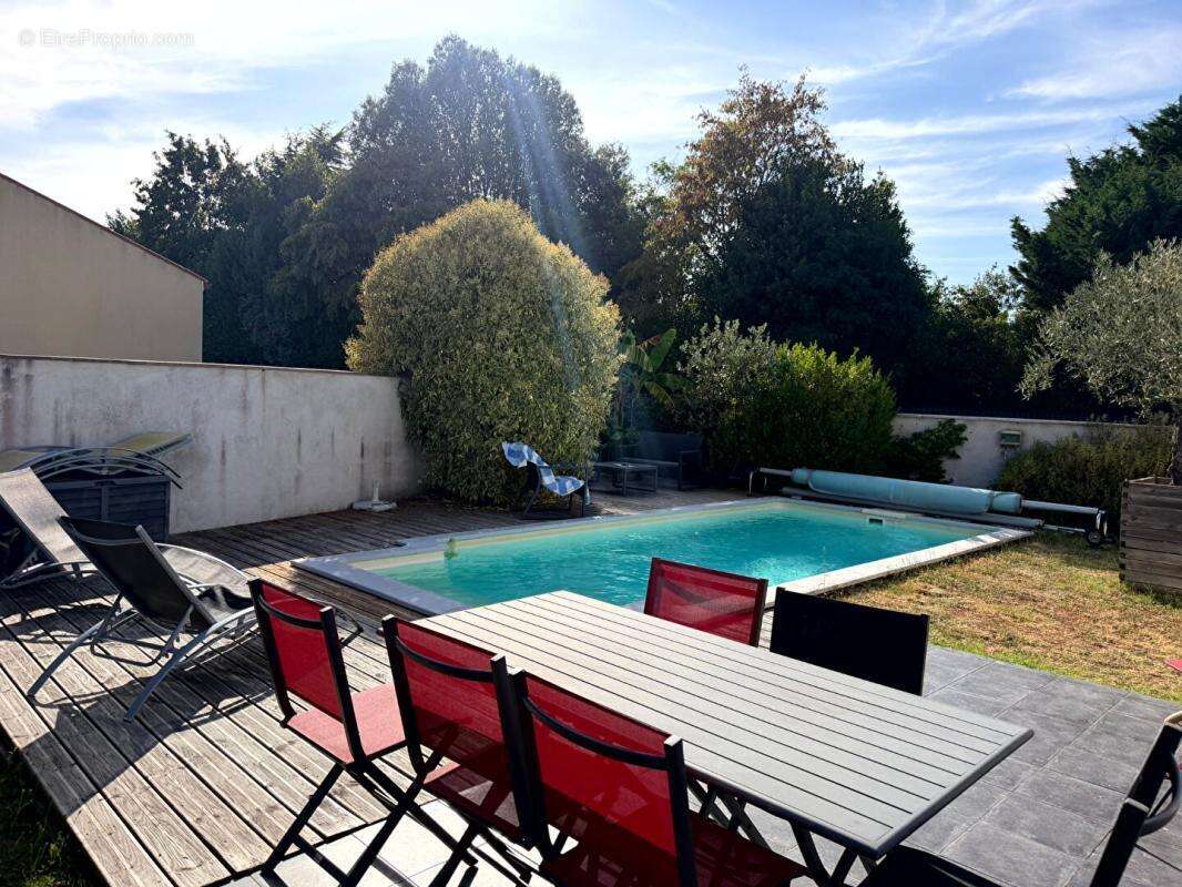 A Meursac Maison de plain pied  de 99.5 m2 avec piscine - photo 8