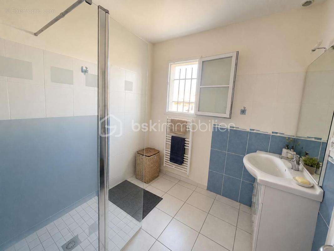 Maison de plain-pied 79 m² – 2 chambres – Jardin – Vendue louée – Arces-sur-Gironde - photo 8