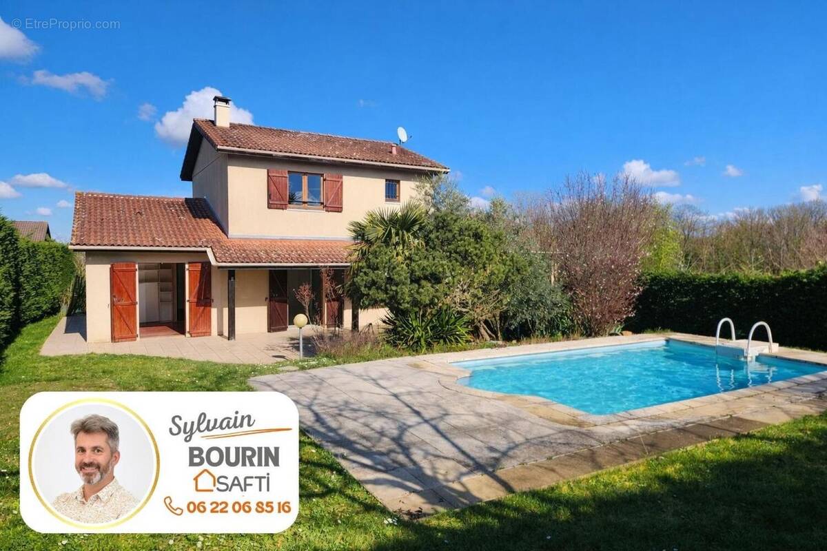 Photo 1 - Maison à JASSANS-RIOTTIER