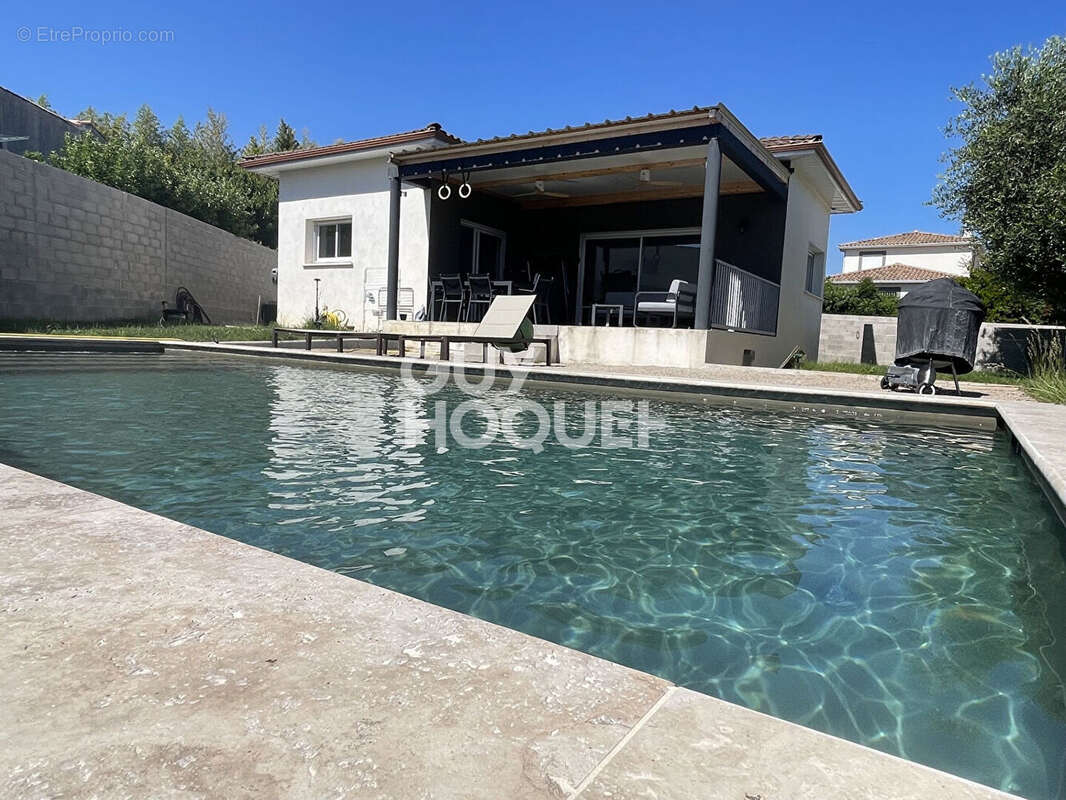 Contemporaine de plain-pied : piscine, 3 chambres, bureau et grand garage - photo 2