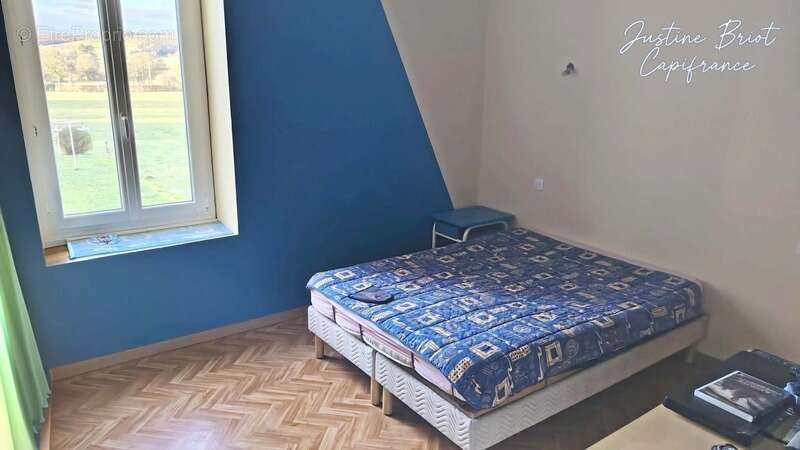Une maison familiale aux beaux volumes, au cœur d’un village où il fait bon vivre - photo 4