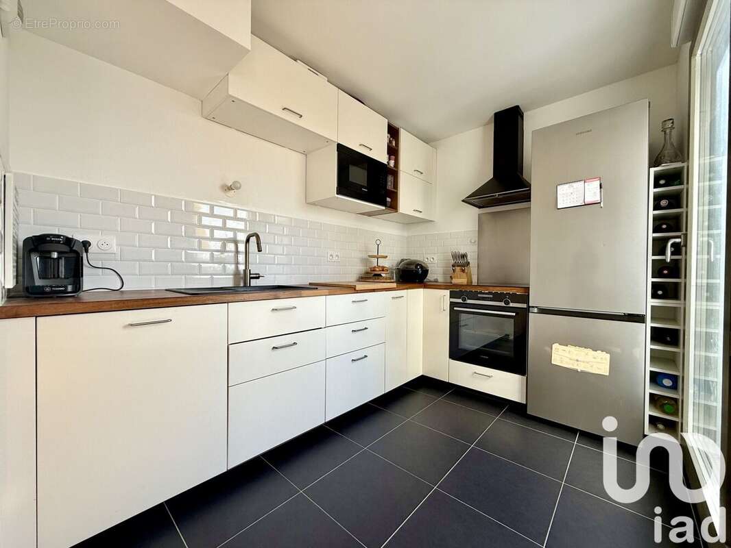 Photo 9 - Appartement à COLOMBES