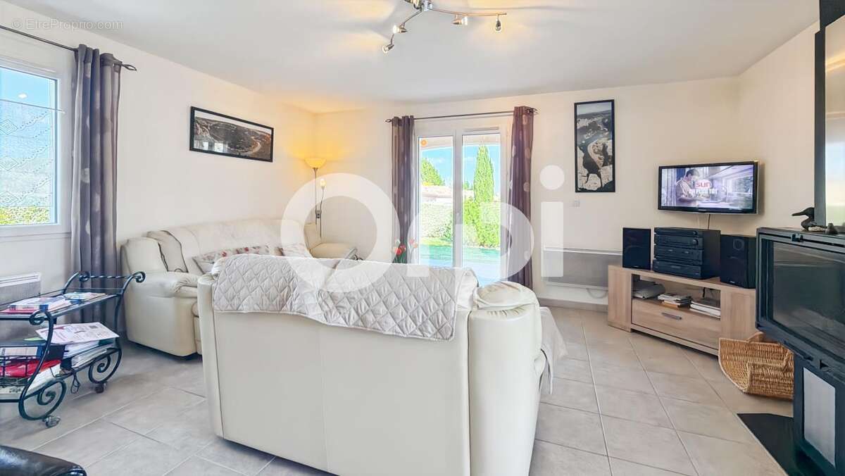 Maison À Vendre sur 1500m² de terrain arboré - photo 11