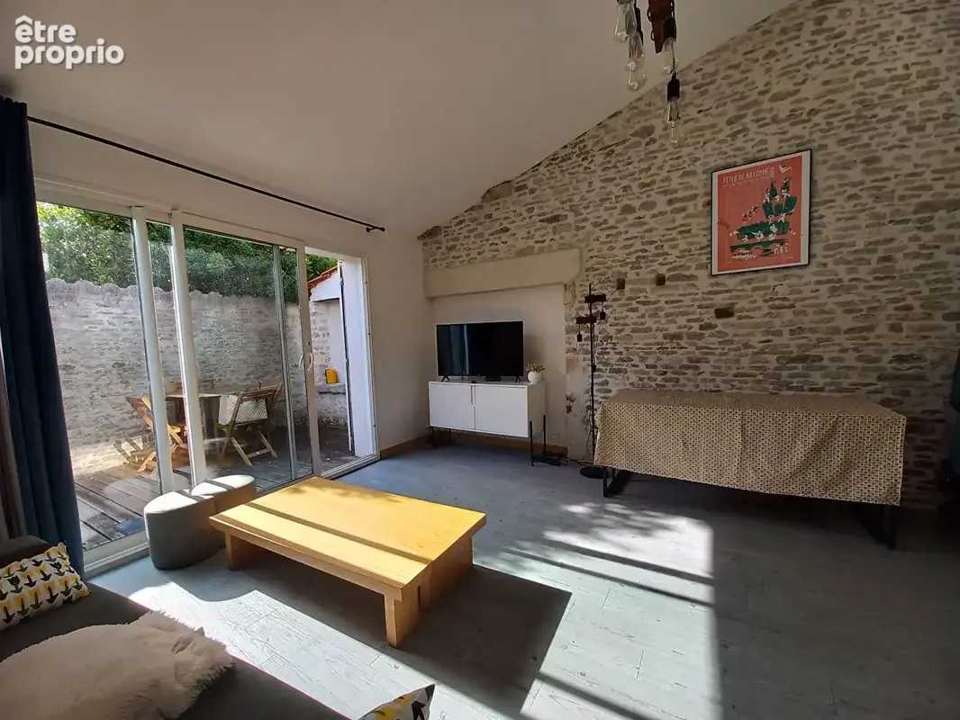 Ancien chai rénové de 57 m² avec patio : charme et authenticité ! - photo 14