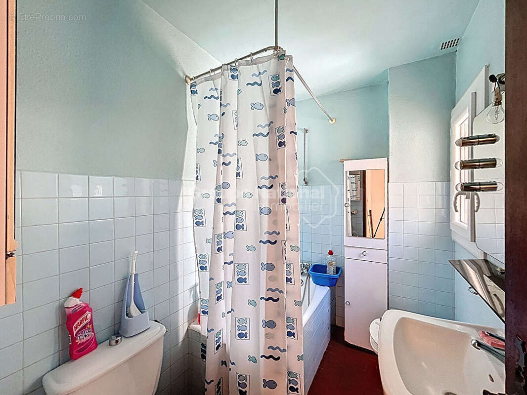 À vendre : maison mitoyenne familiale dans un quartier calme. - photo 11