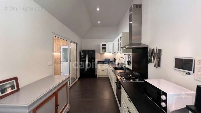 PLONÉIS (29) – Maison à vendre Type 6 de 115 m² habitable et 189 m² utile – Terrain de 1 320 m² – Double garage – Piscine - photo 11