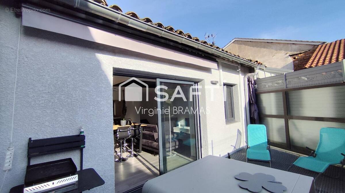 Photo 1 - Maison à SAINT-LAURENT-SUR-SAONE