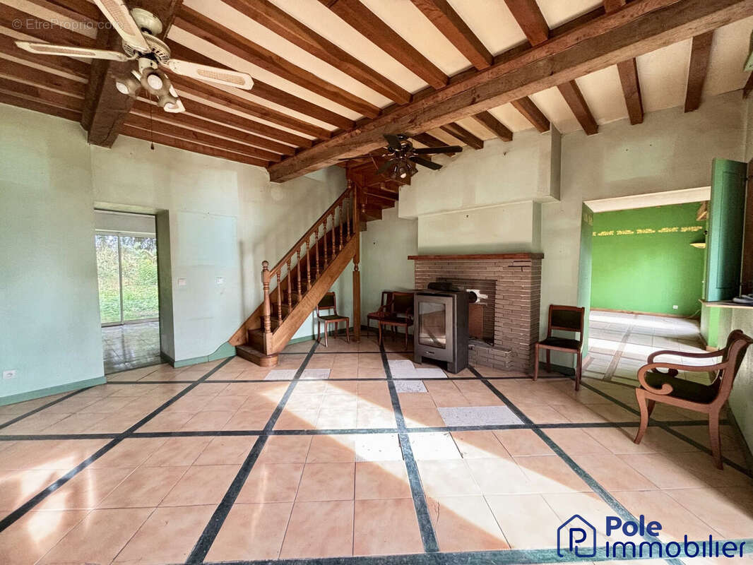 Domaine SAINT MARTIN DES BESACES- Pièce de vie avec cuisine ouverte  - Maison à LE BENY-BOCAGE