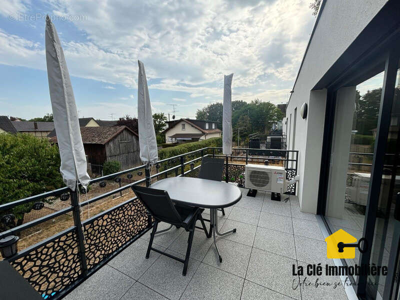 Bartenheim   Superbe appartement 4 pièces de 84 m2 avec balcon, garage, cave et parking - photo 12