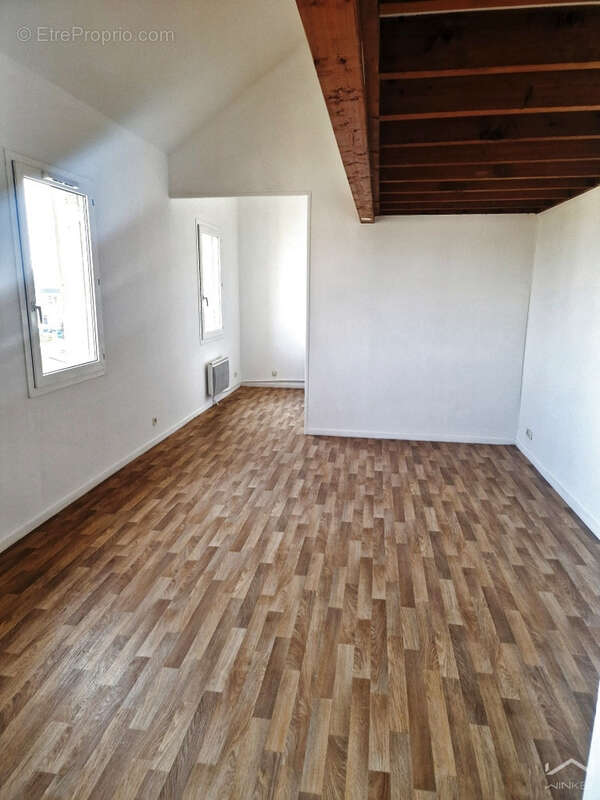 Appartement T2 de 48 m2 en duplex avec place de parking - photo 2