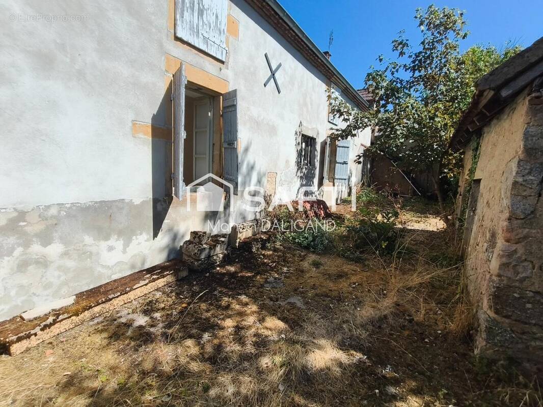 Photo 1 - Maison à ISSY-L'EVEQUE