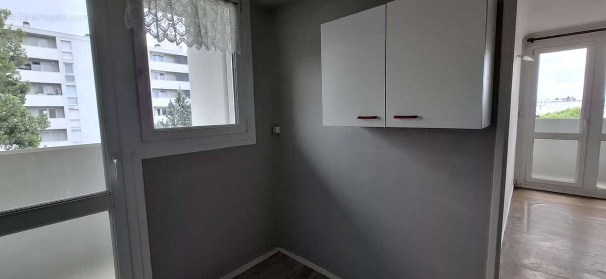 Appartement 2 pièces à vendre dans résidence recherchée avec Ascenseur, Quartier Remicourt SAINT QUENTIN (02) - photo 7