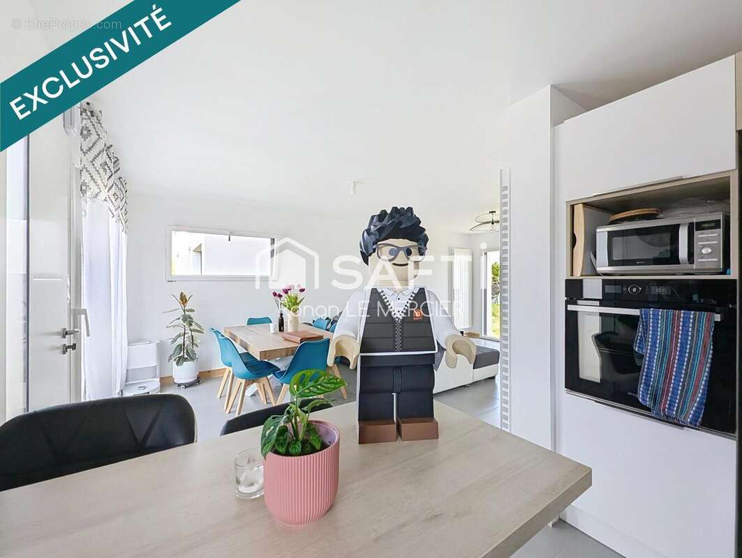 Maison 88 m² à Locmaria-Grand-Champ  - photo 3
