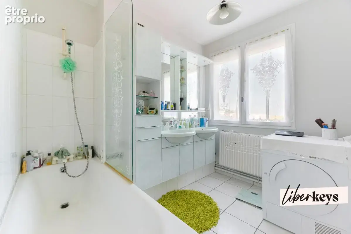 Appartement T4 de 77 m² avec balcon, cave et parking équipé - photo 5
