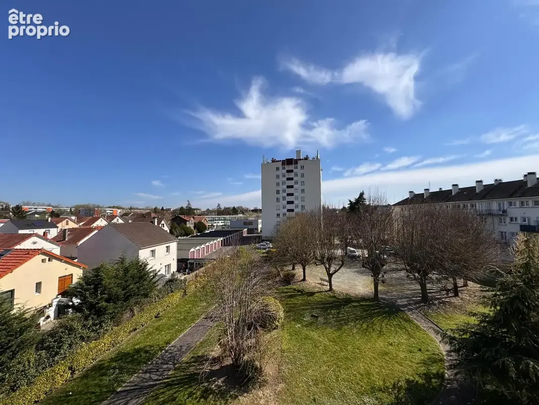 Appartement 4 pièces à Brétigny-sur-Orge   Résidence arborée, balcons et fort potentiel - photo 14