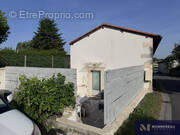 Maison à REIGNAC