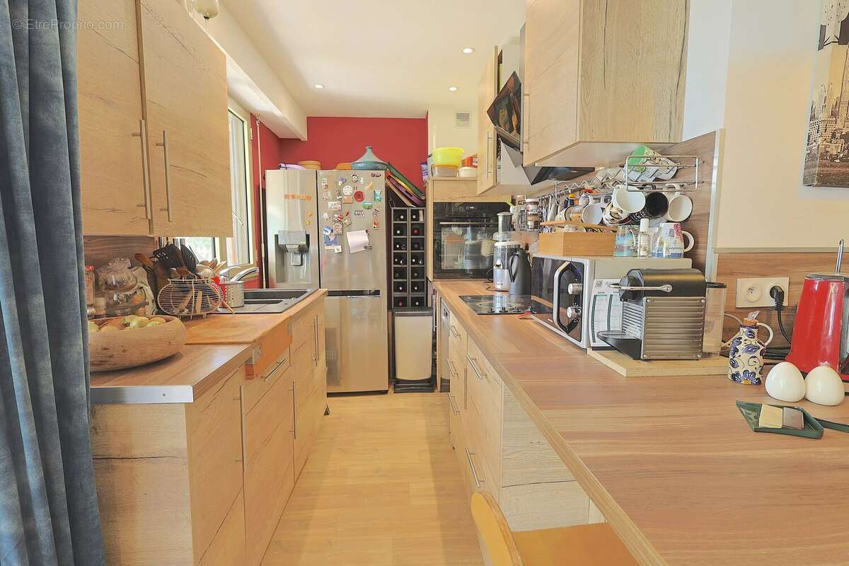 Rare à la vente – Superbe 2 pièces en rez-de-jardin avec 80 m² d’extérieur dans résidence de standing avec piscine - photo 9