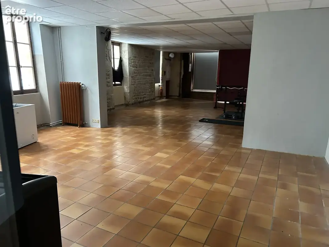 Au coeur de premery immeuble avec local commercial et appartement - photo 5