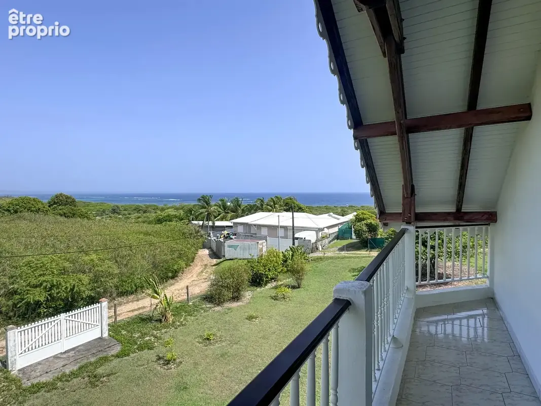 LE MOULE — Maison familiale avec vue mer + appartement T3 indépendant  Terrain de 4 840 m2 constructible - photo 28