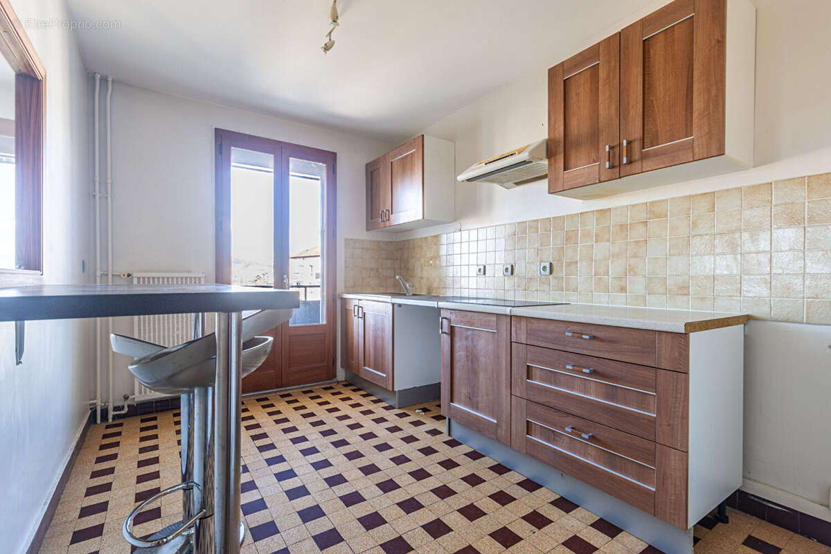 Agence immobiliere laforet - exclusivite - "duranta" - annecy - appartement t3 de 59.24 m² - cave - grenier - renovation energet - photo 5