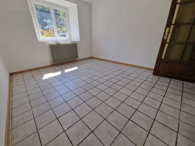 Appartement à vendre 3 pièces en rez-de-jardin proche de EPINAL (88) avec TERRASSE et TERRAIN - photo 11