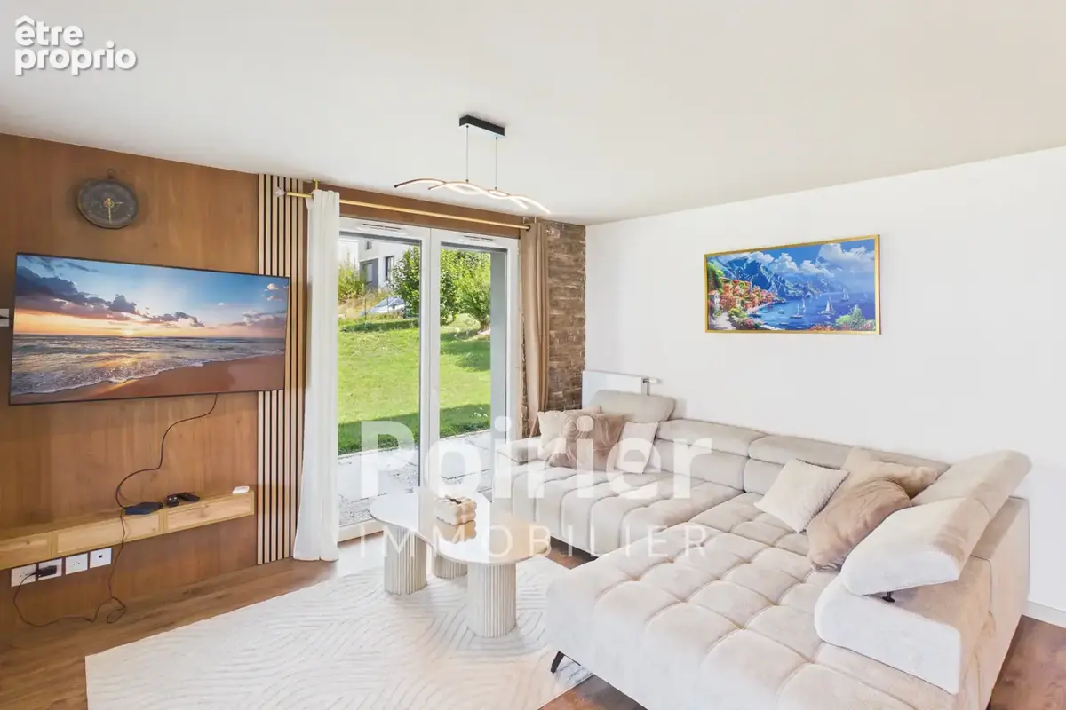 Appartement rénové de type 3 à EVIAN avec jardin vue lac et stationnements - photo 4