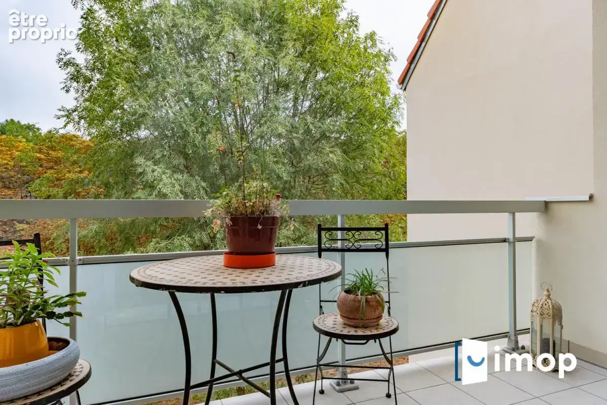Duplex familial de 89 m² avec balcon, parking et cave - photo 8
