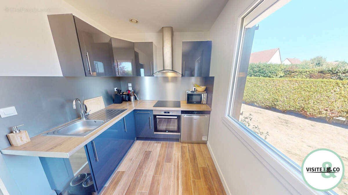 Maison 99 m² à Fontenay-Le-Marmion  - photo 4