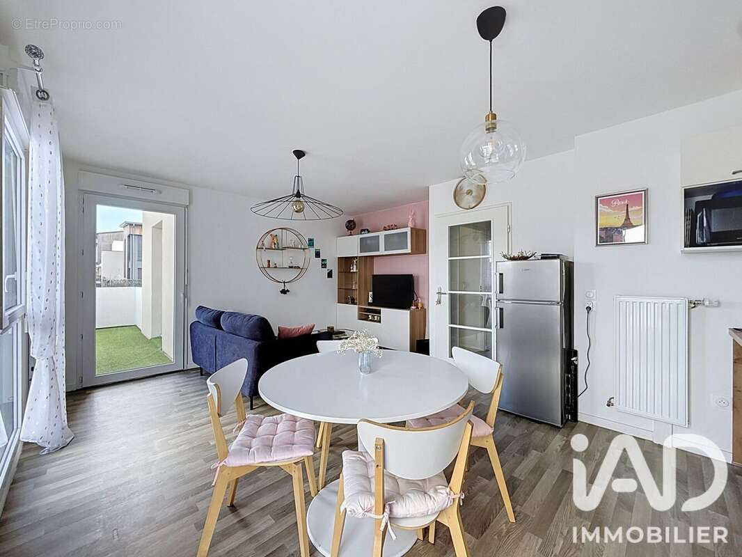 Appartement 61 m² à Louvres  - photo 2