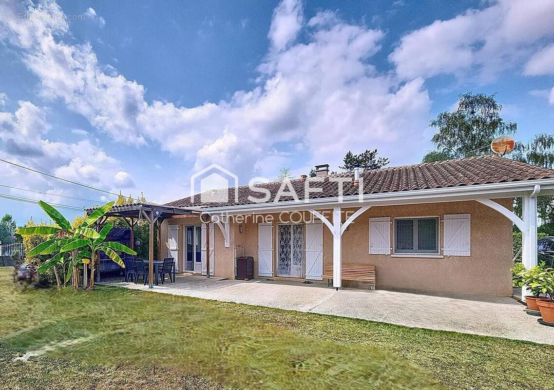 Photo 1 - Maison à CADILLAC