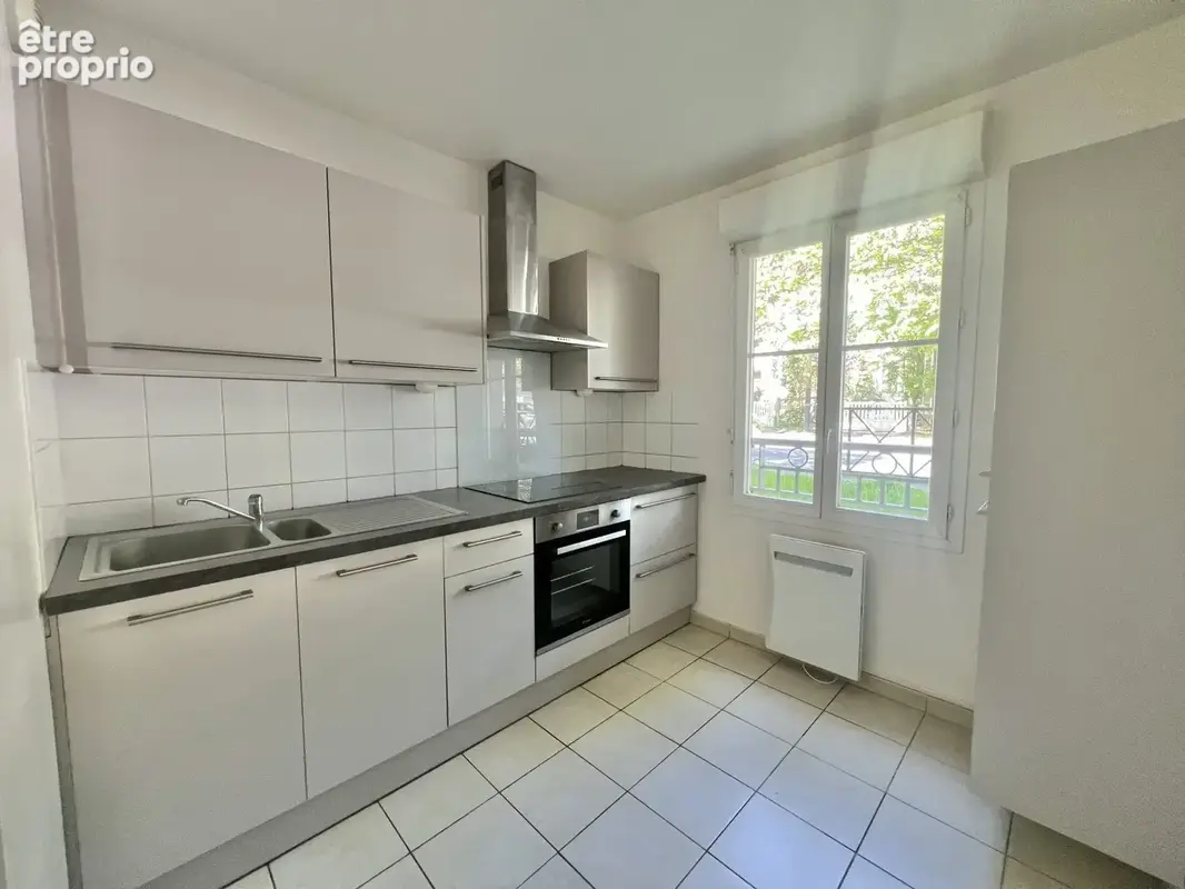 Appartement 3 pièces 59 m² à vendre à Trappes (78190) - photo 4