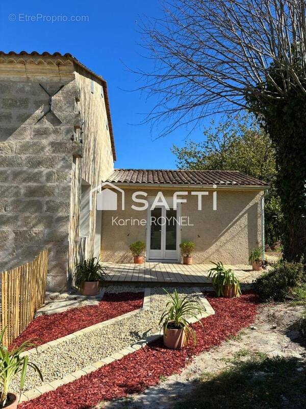 Photo 1 - Maison à LUSSAC