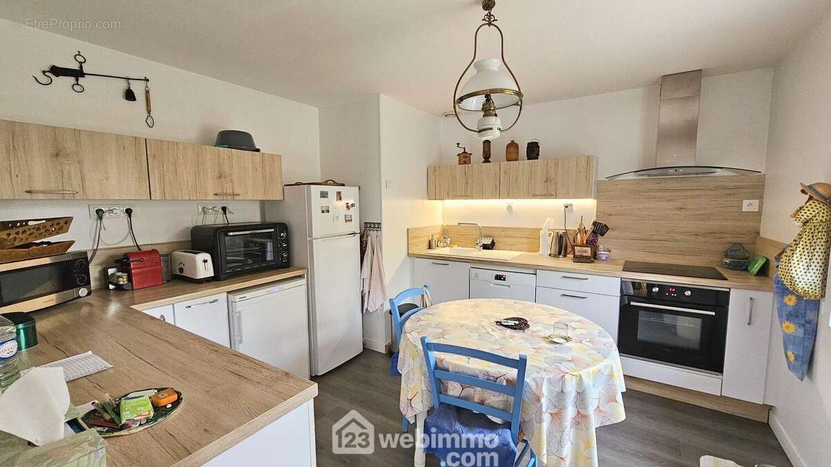 Une cuisine de 12 m² fonctionnelle. - Maison à MILLY-LA-FORET