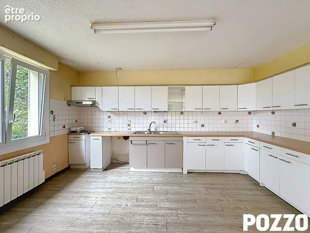A Vendre - Saint Jean De La Haize - Maison 7 pièce(s) 140.83 m² - sous sol - vie de plain pied - photo 7