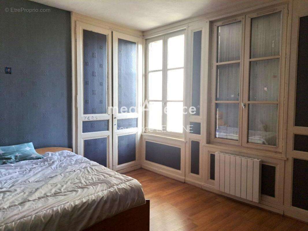 à ORBEC IMMEUBLE en monopropriété 7 appartements 1 boutique 1 local - photo 8