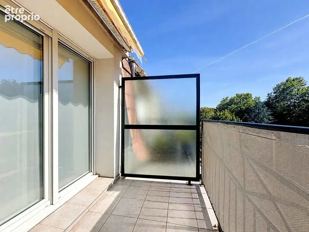 Appartement  dans un cadre privilégié au CENTRE VILLE - photo 3