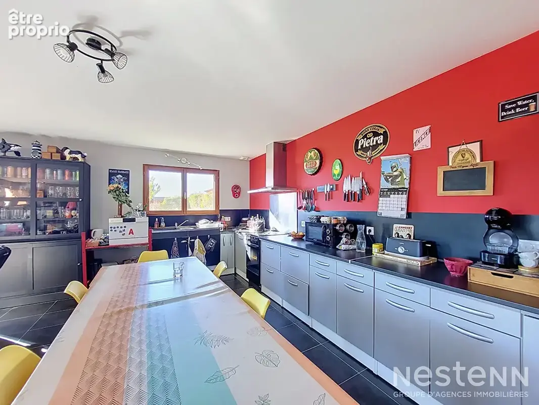 A Vendre Maison contemporaine de plain-pied, double garage, Carport et terrain de 1 731 m². - photo 3