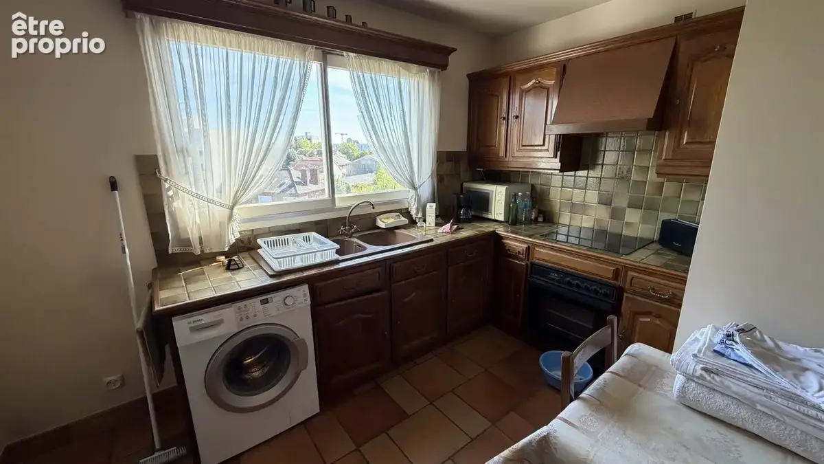 Appartement 4 pièces 85 m² à vendre à Le Bourget (93350) - photo 3