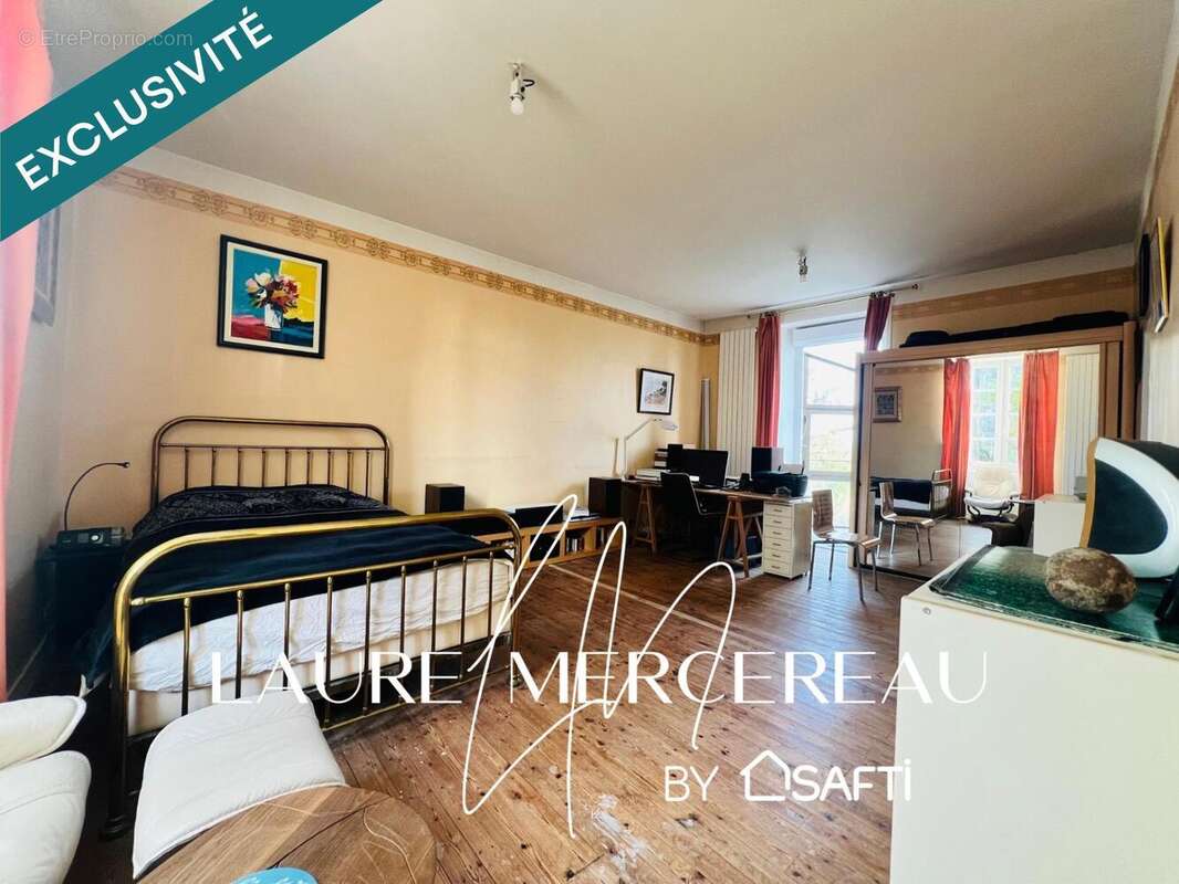 Photo 7 - Maison à SAINT-ETIENNE-DU-BOIS