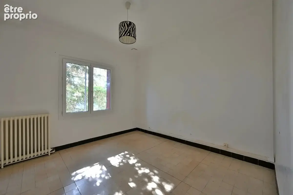 Maison de plain-pied 80 m² avec jardin et garage – Quartier prisé des Alyscamps! - photo 11