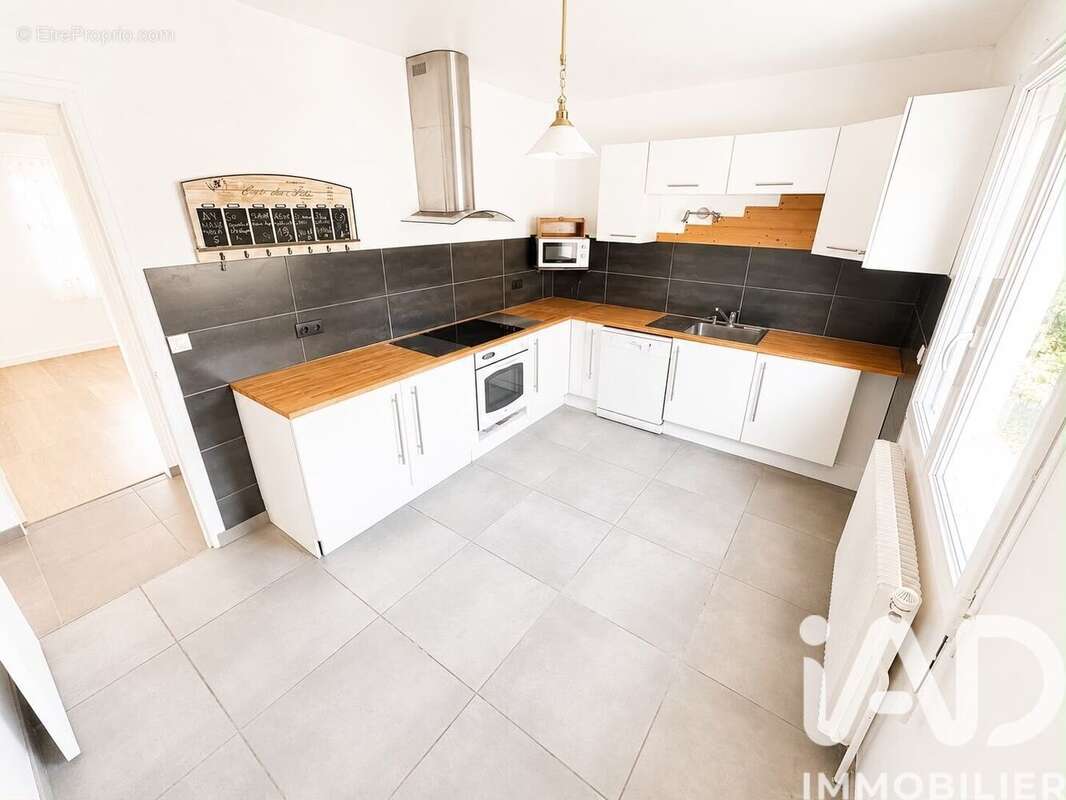 Maison 115 m² à Saint-Arnoult-En-Yvelines  - photo 6