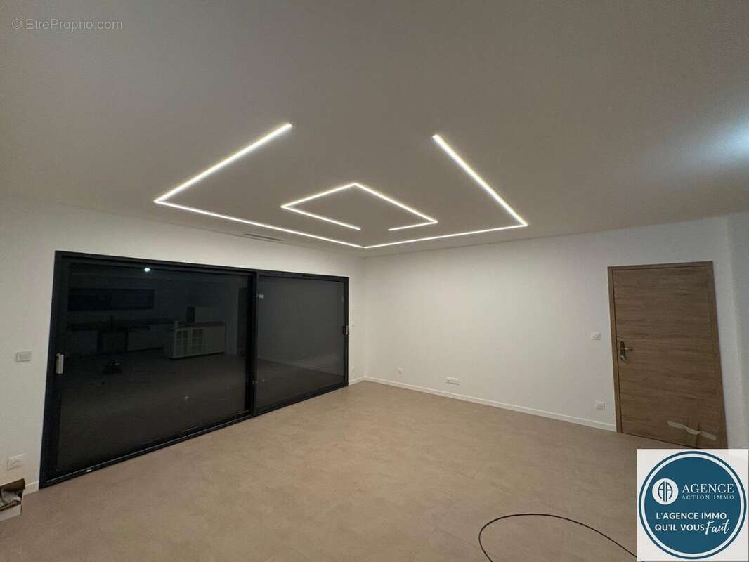 Construction neuve de standing  107 m²  Terrain 427 m²  Garage  DPE A  Sablons (38550) - photo 2