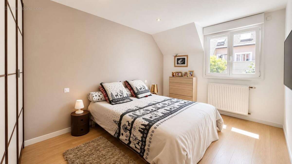 Duplex T4 Vieugy avec jardin + garage + cave - photo 6