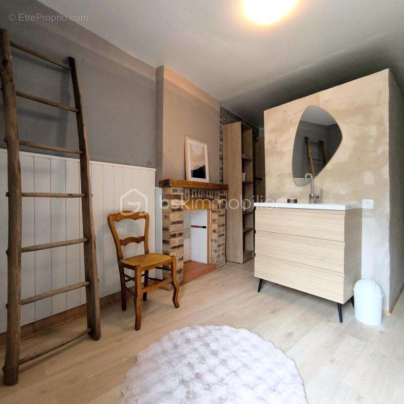 Maison à JUVIGNE
