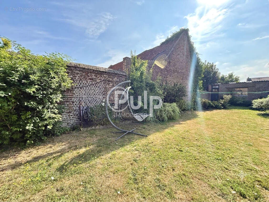 Charme et grands volumes au cœur de Seclin - photo 12