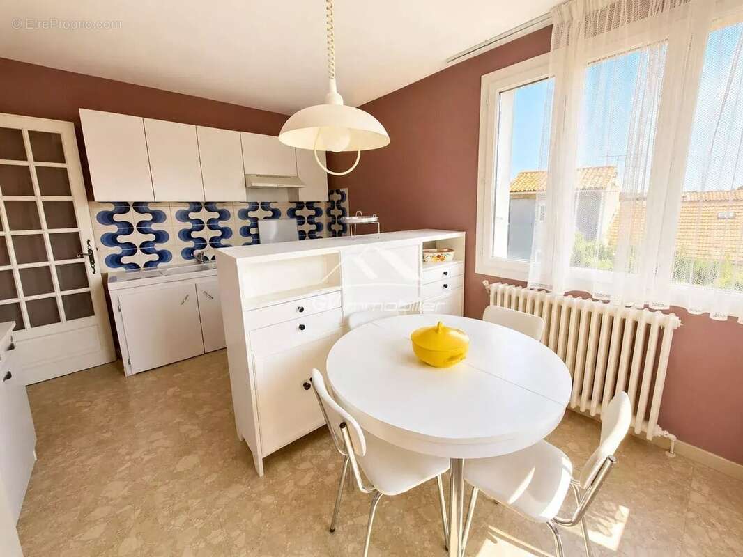 A Alès, maison d'environ 142 m² avec terrain attenant proche des commodités - photo 3